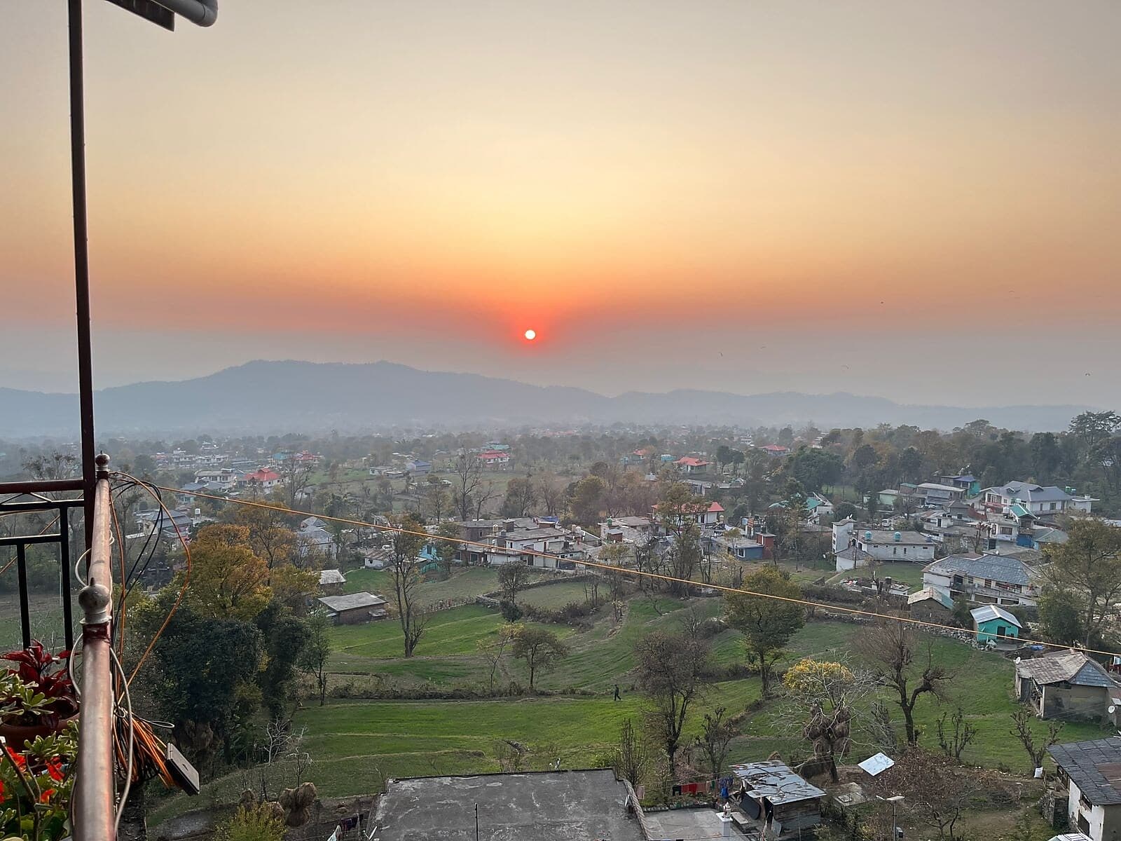 Sunset over Vill Kotli from Sunset Point Homestay, Bir